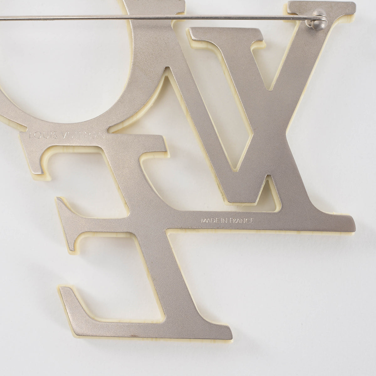 Louis Vuitton LV Symphony Brooch Gold Metal